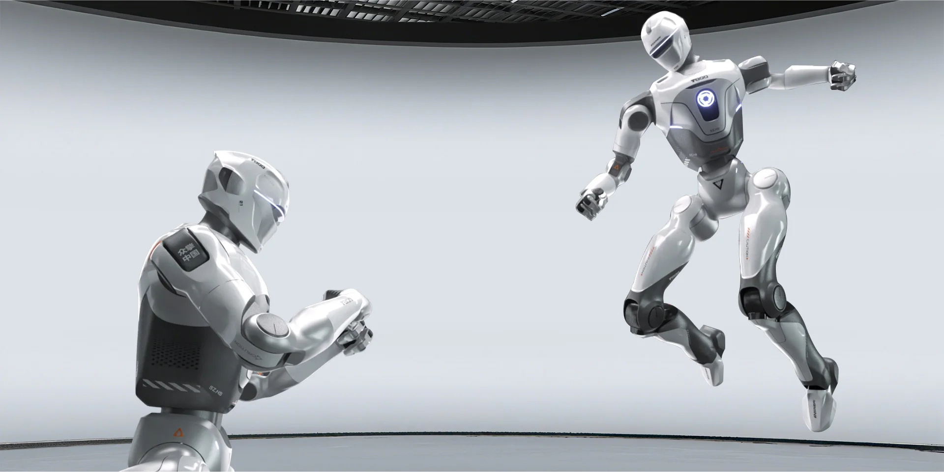 Two EngineAI T800 robots sparring — one seen from behind, one airborne facing the camera